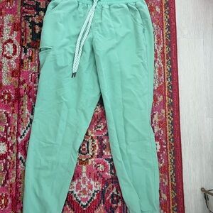 Jaanuu green scrub pants and scrub top